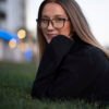 Comparison of a woman wearing glasses before and after applying a preset