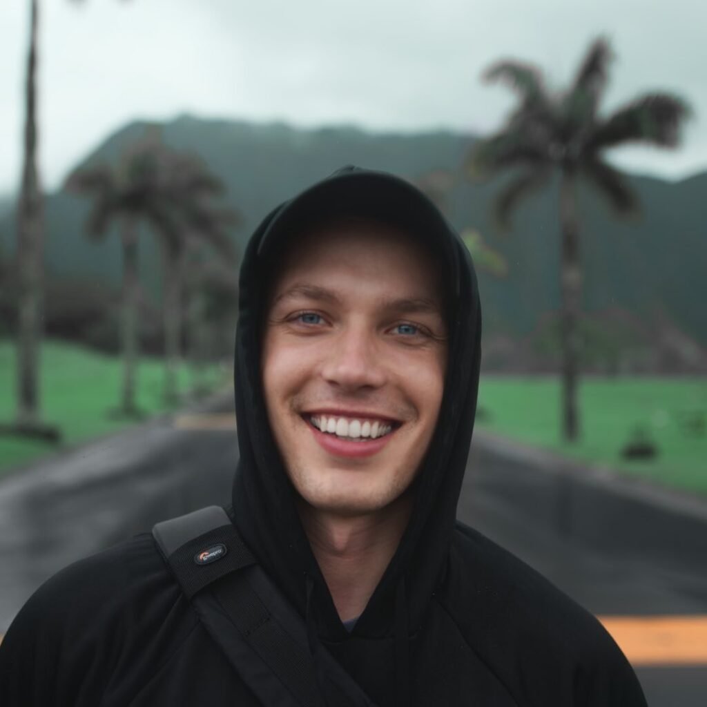 Image of Jake Chappell smiling against the backdrop of Hawaii.