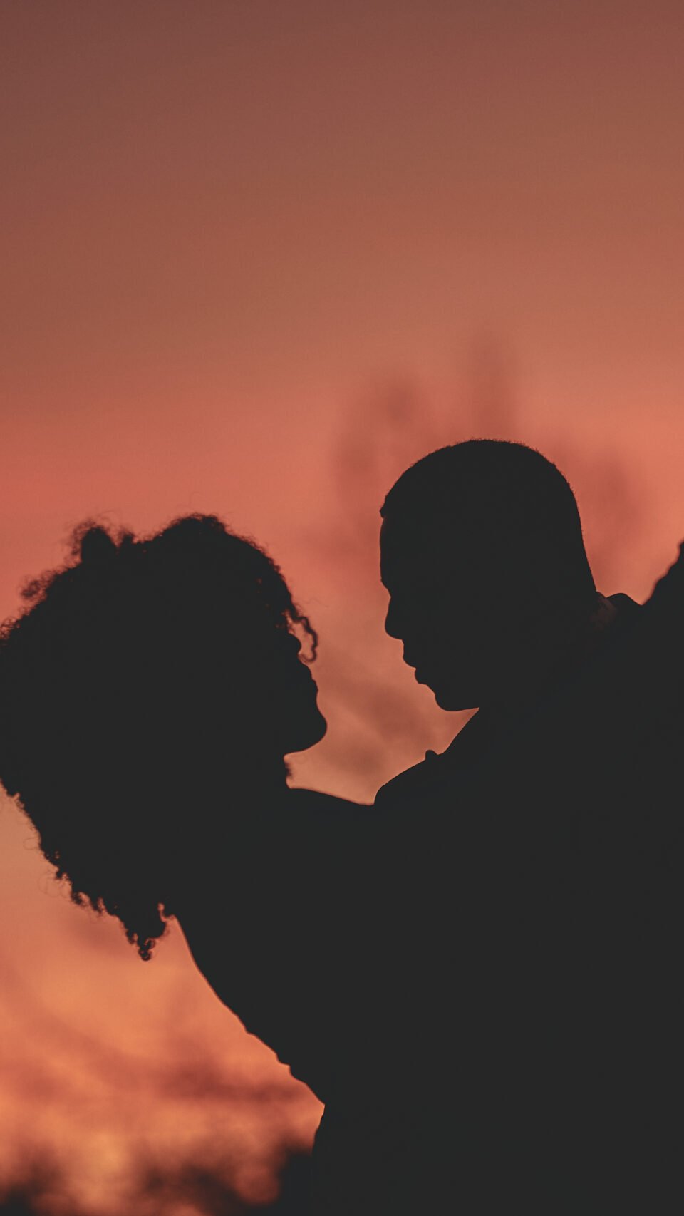 Silhouette of a couple dancing in love